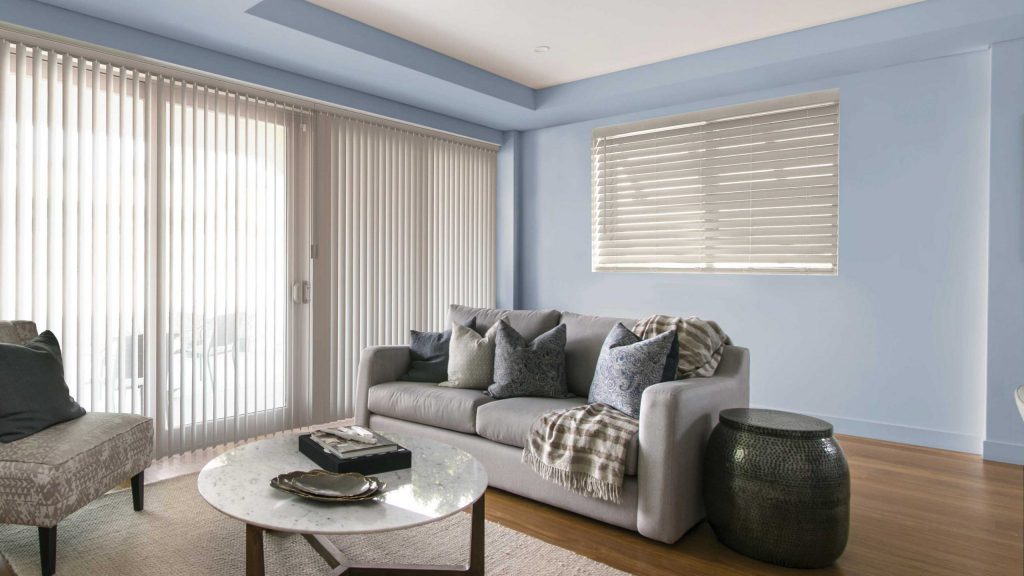 Veneta faux wood vertical blinds in misty sky